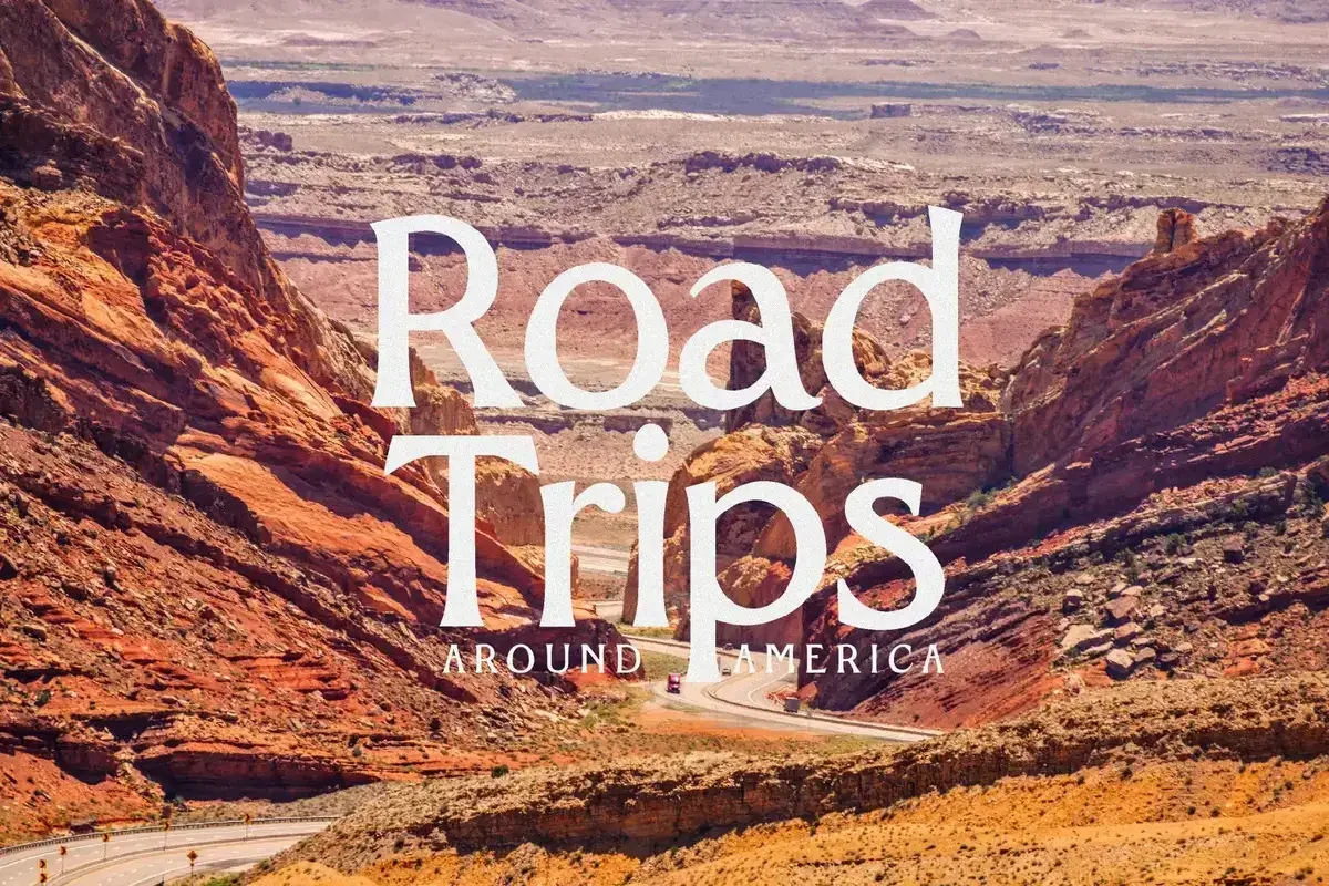Bold white text "Road Trips Around America" set against a red rock canyon landscape, promoting road trip adventures and travel.