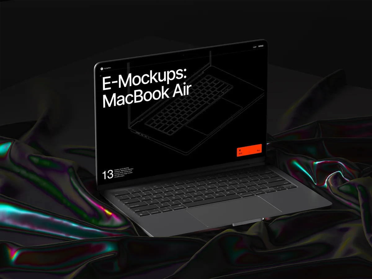 A MacBook Air with a dark screen lies on a shimmering, iridescent fabric, creating a striking contrast and elegant setting for presenting web and app designs.