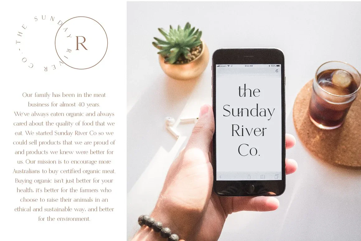 A mobile phone displaying the website for "The Sunday River Co." next to a description about organic products, accompanied by a circular logo on a clean, minimalist table setting.