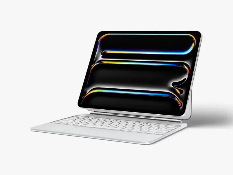 A side view of an iPad Pro mockup in a white keyboard stand, displaying the same glossy, colorful pattern on the screen.