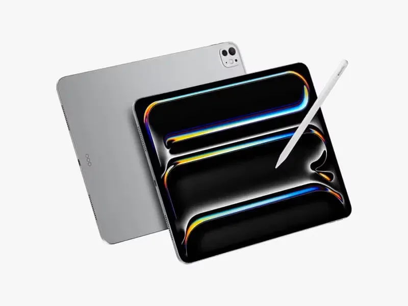 Two iPad Pro mockups, one in space gray and one in silver, along with an Apple Pencil, showcasing a professional setup with a modern interface.