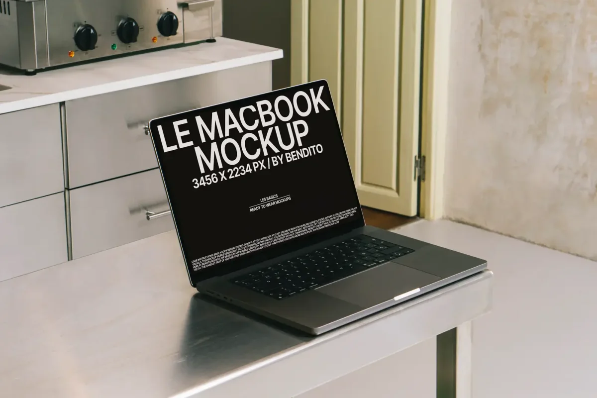 A Macbook Pro on a desk displaying the words "Tougher than you think" on its black screen. Created by Bendito Mockup for UX and UI designers.