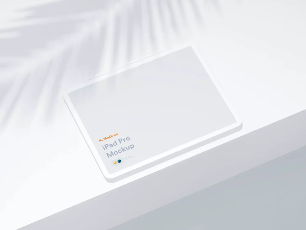 A top-down view of an iPad Pro mockup on a white surface, with "N. Mockups iPad Pro Mockup" written on the screen.