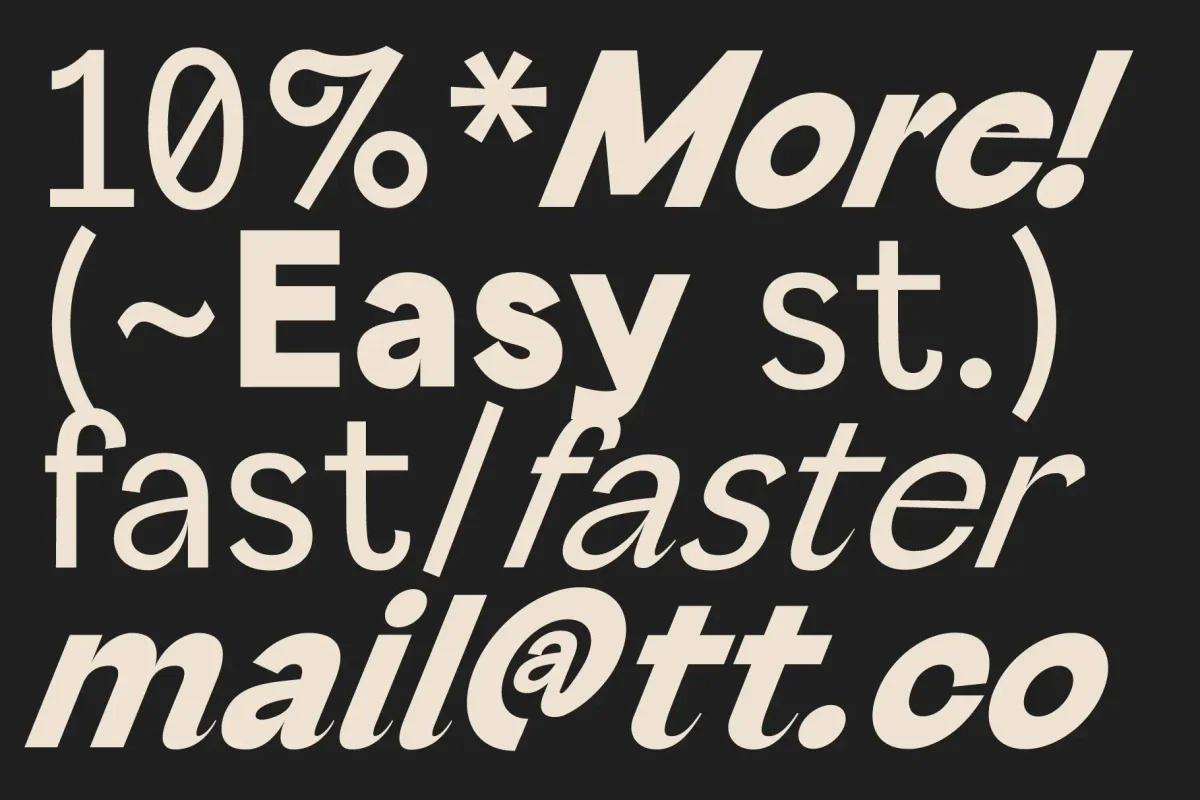 Cream-colored font on a black background showcasing different typographic elements like percentages, punctuation, and email addresses in bold styles.