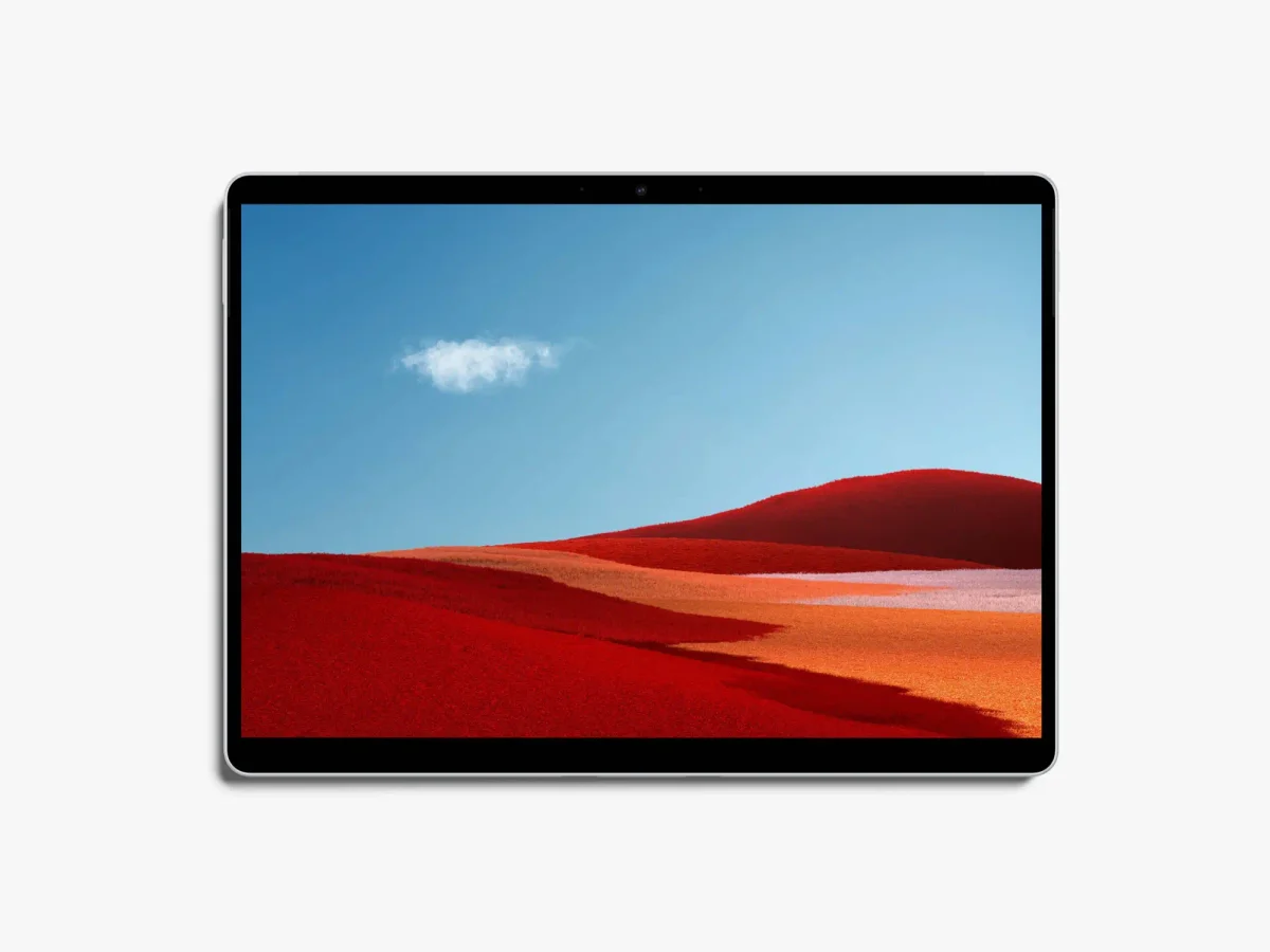 Surface Pro in tablet mode, displaying the same red desert landscape in a fullscreen view.