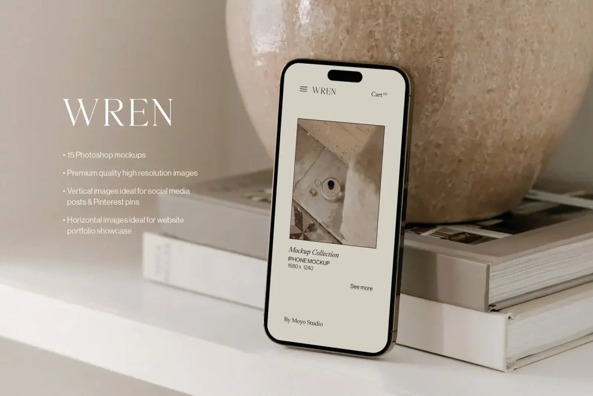The image of an iPhone placed vertically on stacked books with a beige, textured vase in the background, highlighting a minimalist and elegant design theme. From the Wren Mockup Collection by Moyo Studio.
